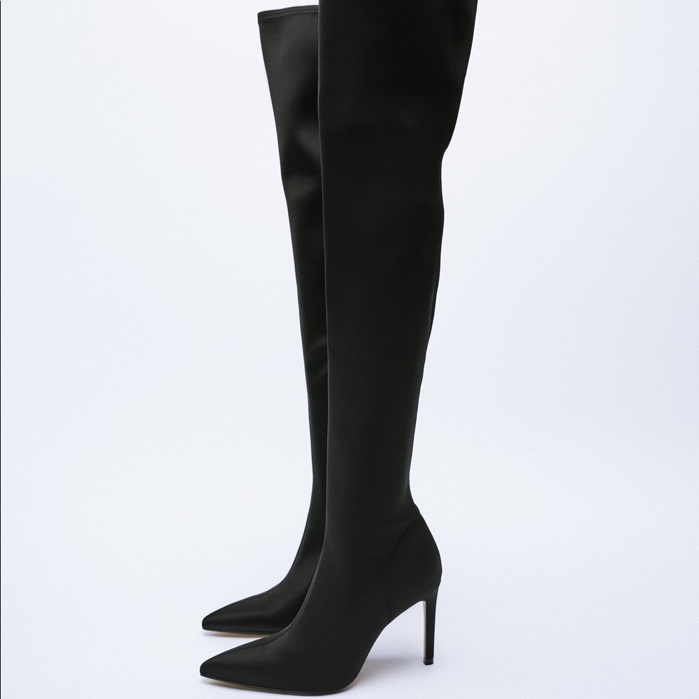 Over the knee high heel pointed boots